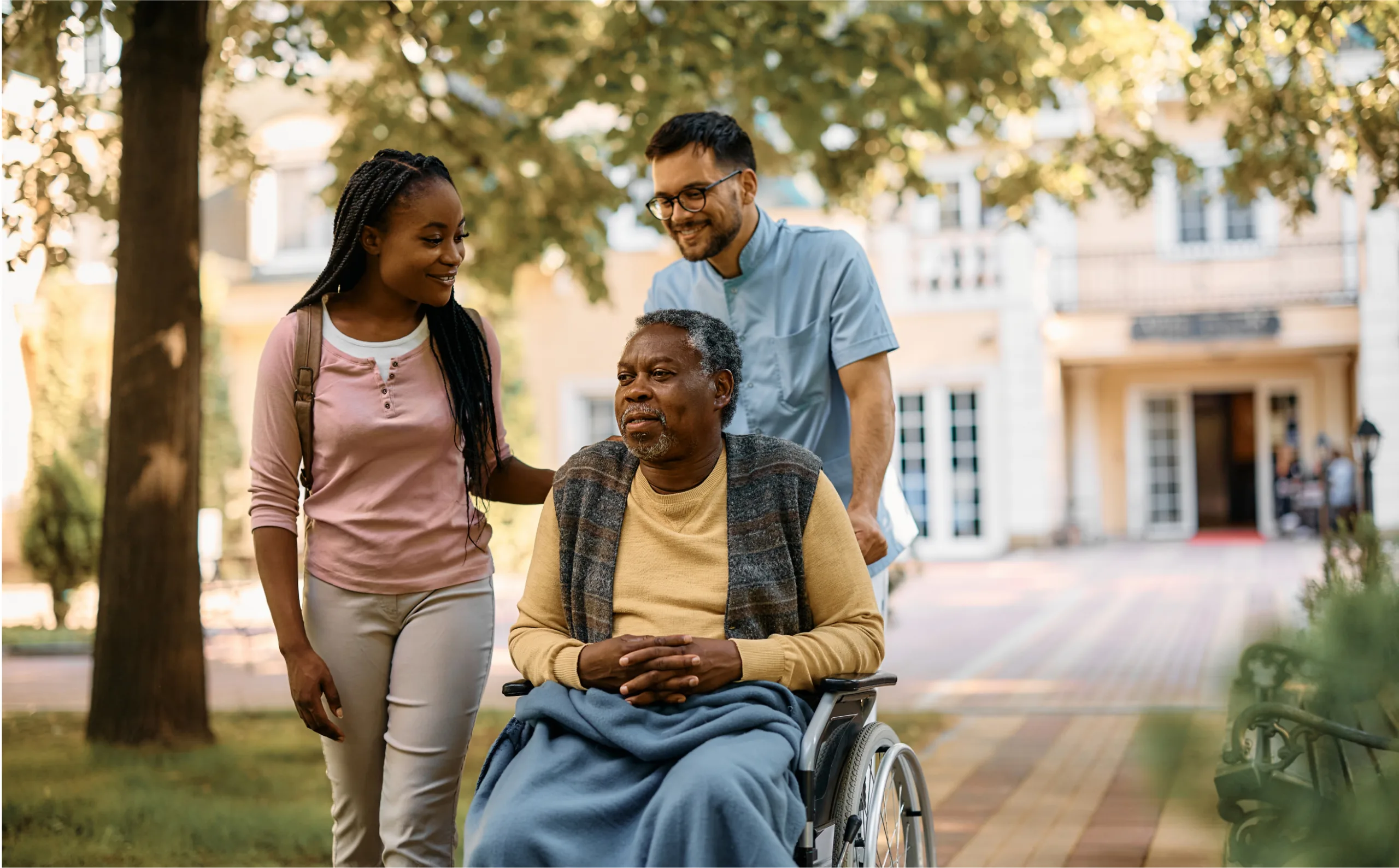 black-senior-in-wheelchair-enjoying-with-his-daugh-2023-02-23-22-34-56-utc